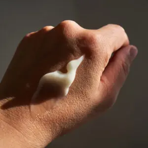 A person holding something in their hand