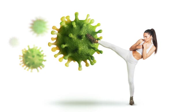 A person kicking around a green virus.