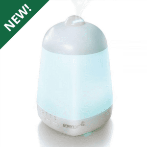 A white and silver humidifier with blue lights.