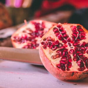 A close up of two pieces of fruit