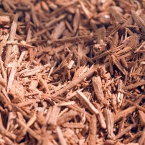 A close up of wood chips on the ground